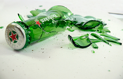 A broken Heineken bottle